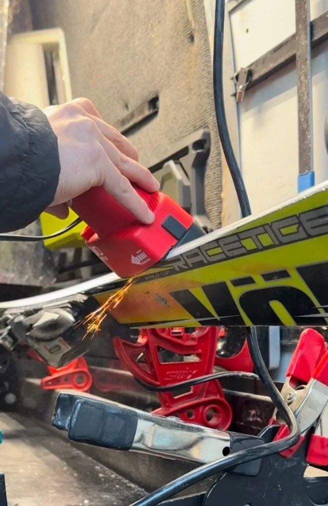 Edge tuning with professional power tool - sparks flying